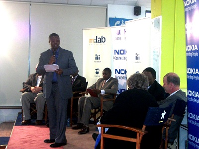 eMobilis Managing Director introducing the guest of honor during the m:lab launch.